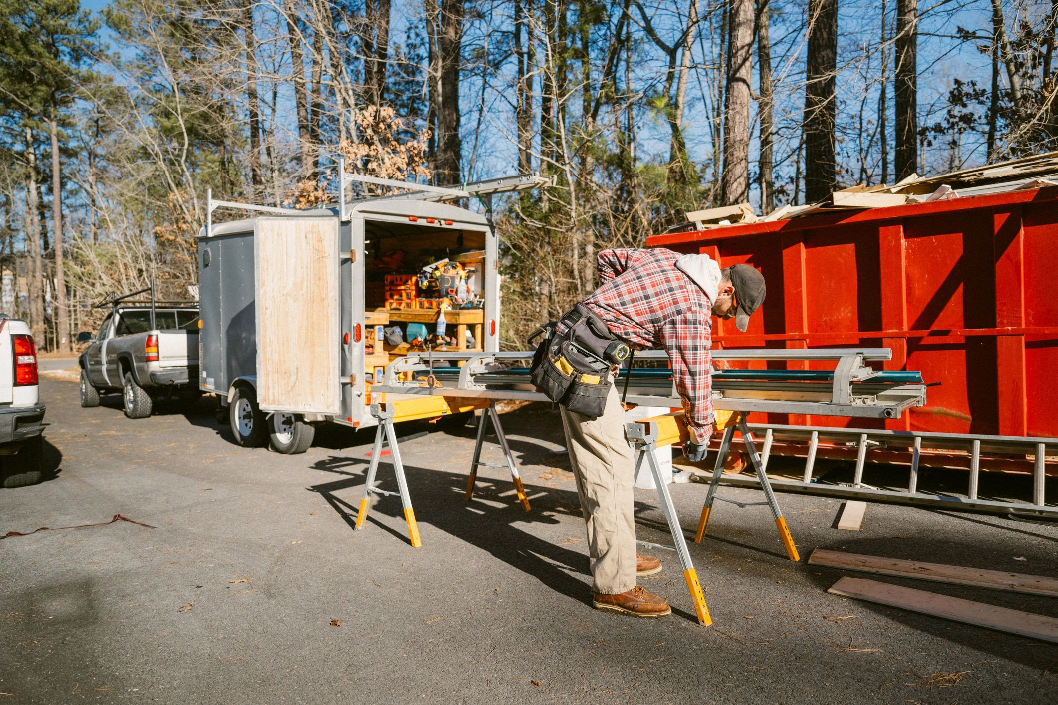 Arborist preparing rigging equipment for tree removal